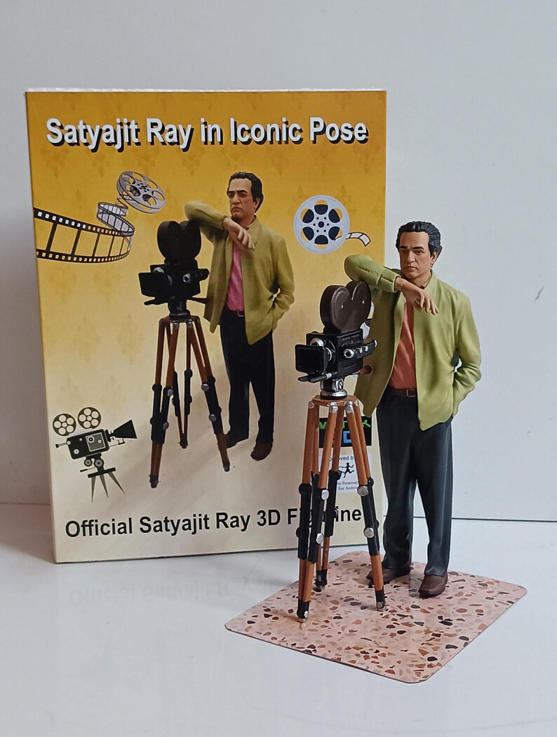 Satyajit Ray Iconic Pose with Vintage Movie Camera